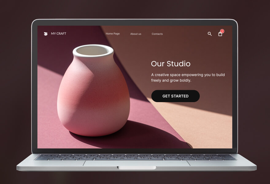 Modern laptop mockup showcasing a minimalist "My Craft" studio website with a soft pink aesthetic, highlighting the design flexibility of the SiteGround Website Builder.